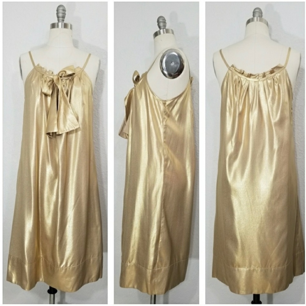 This gold, brand new DVF dress is 100% silk and a true Beauty!!!